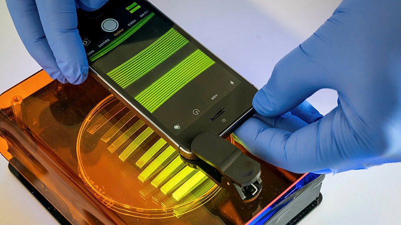 A photo of a smart phone in a lab.
